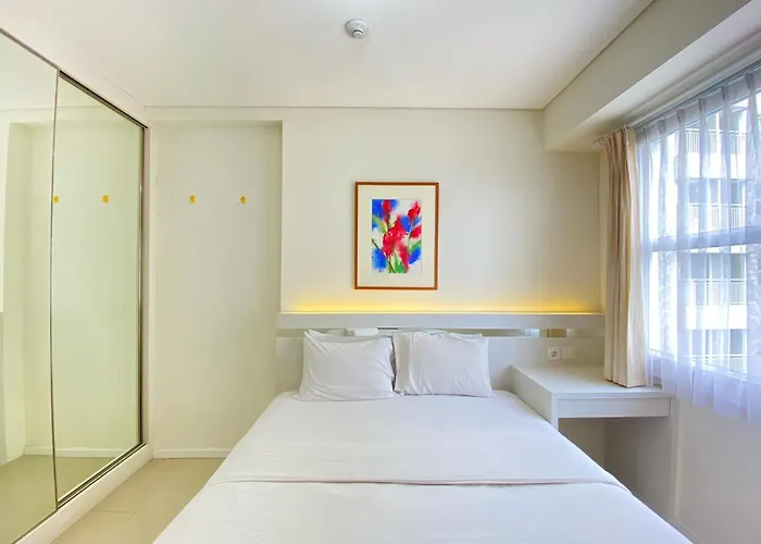 Minimalist And Spacious 1Br Apartment At Parahyangan Residence By Travelio